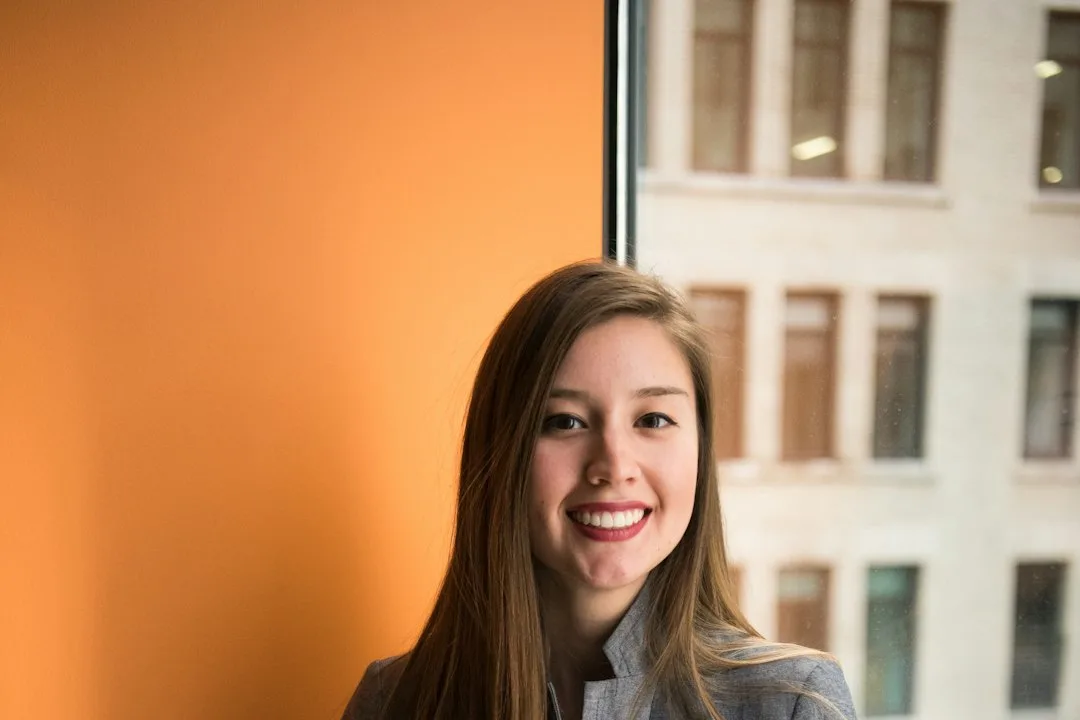 A professional portrait in a bright studio