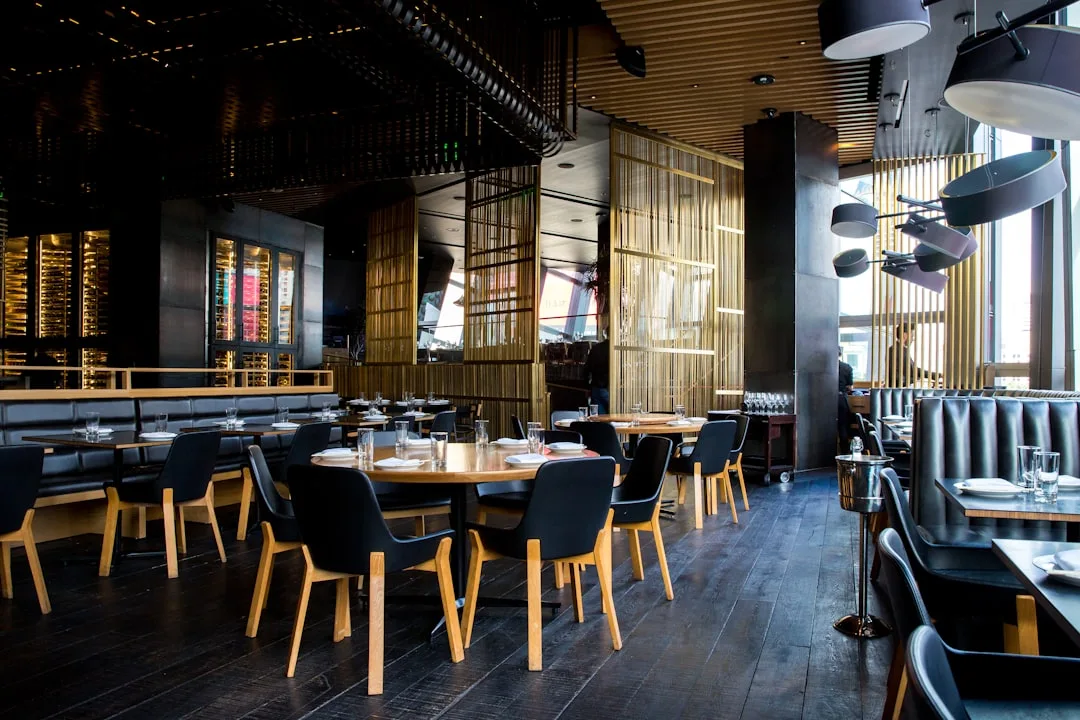 A warm, candlelit Italian restaurant dining room